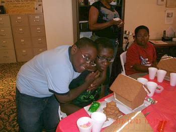Photo of children making gingerbread houses