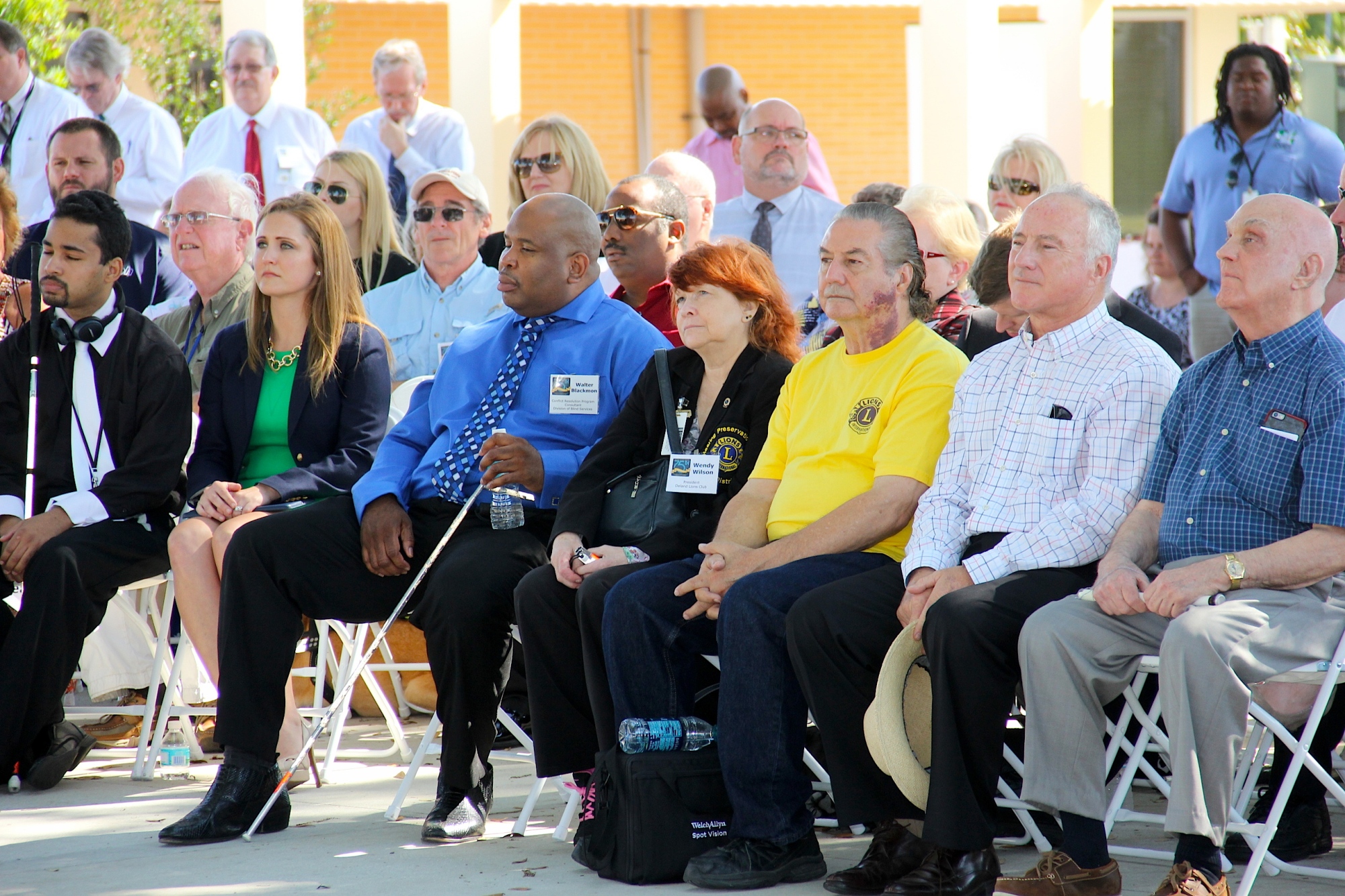 Guests listen intently to the speaker during the 75th anniversary program