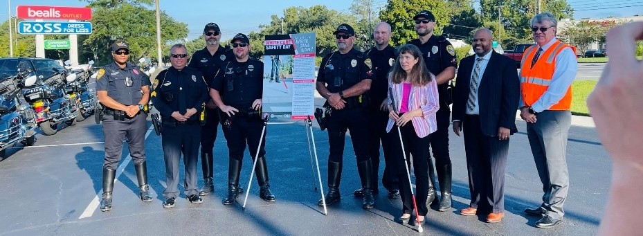 Members of the Tallahassee Police Department, the Florida Department of Transportation Secretary, the Florida Division of Blind Services Director, and DBS staff white cane user pose for a picture after safety demonstration.