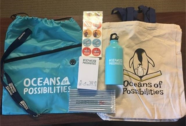 give away items with oceans of possibilities theme on them.