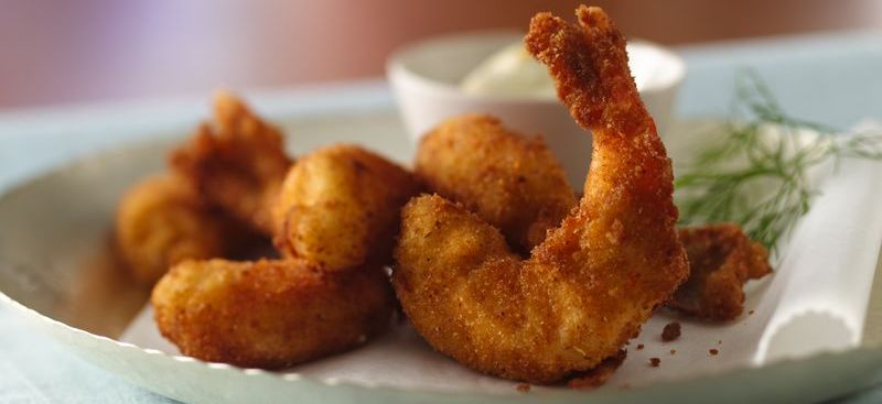 Shrimp on a plate on the table.